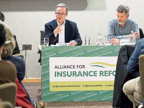 Peter Boland and Eoin McCambridge of the Alliance for Insurance Reform pictured at the public meeting at the Strand Hotel Picture: Don Moloney