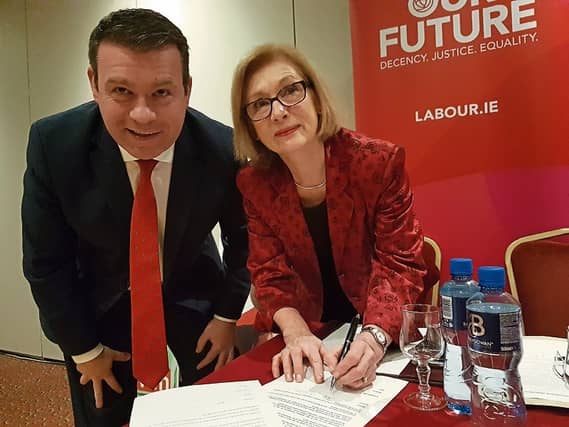 Former Education Minister Jan O’Sullivan, who will be fighting her ninth Dail election for Labour, pictured signing Labour’s party pledge with Tipperary TD Alan Kelly