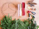 With just a few bits from the gardening a homemade Christmas wreath is both easy and decorative