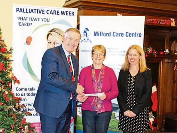 Winning author Peg Prendeville, centre, with Pat Quinlan CEO and Joanne Callinan both of Milford Care Centre