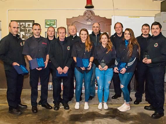 Members of Cappamore Fire Service being presented with plaques for winning Limerick’s Fittest Superstars and were thanked for handing back their prize of €1,000 to the playground fundraising committee