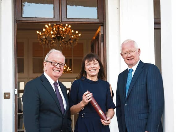 UL president, Dr Des Fitzgerald, 1,000th graduate Theresa Curley, and Niall Cody, chairman of Revenue Commissioners