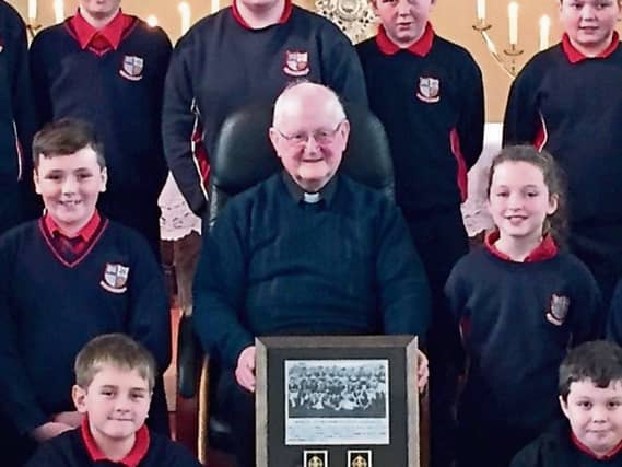 Fr Pat Currivan, Caherline NS pupils and his ‘missing’ medals