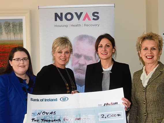 Stephanie Power, second left, Limerick Solicitors’ Bar Association president presenting a cheque for €2,000 to Una Burns, Novas with colleagues Elizabeth Walsh and Niamh White