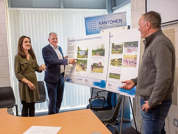 Patricia O’Sullivan, Jack O’Connor and Joe Kelleher, Kantoher Development Group, looking over plans for the innovative reed bed system that is being developed near Raheenagh