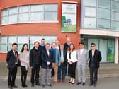 The delegation from Hong Kong, pictured with Senator Kieran O’Donnell and Ray O’Halloran, outside the Limerick Regeneration offices in Moyross | PICTURE: Michael Cowhey