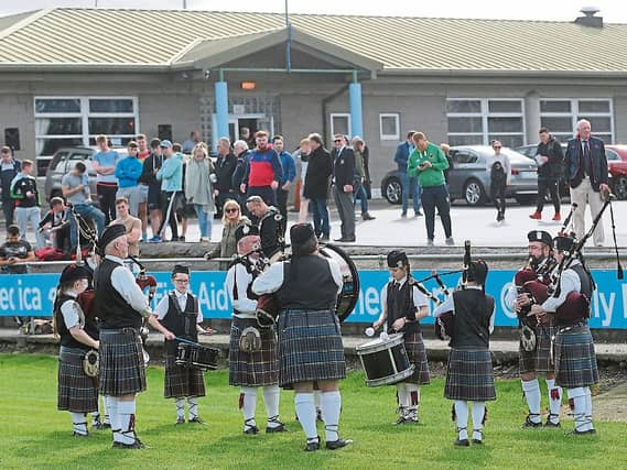 Keeping a long tradition alive: Members of Limerick Pipe Band playing before the Garryowen match against Clontarf in the All Ireland League recently Pictures: Gareth Williams