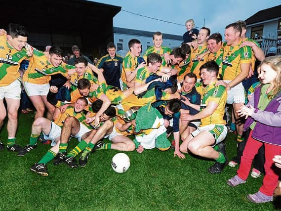 Two Mile House celebrate after defeating Huntestown Rovers in 2014. Picture: Adrian Melia