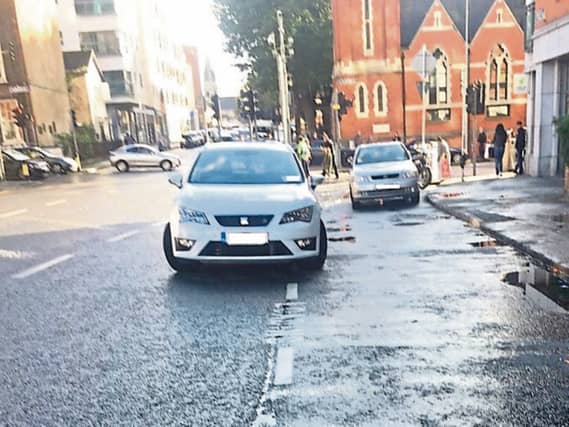 Car double-parked outside Henry Street garda station