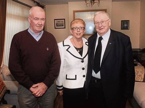 Des Fitzgerald, right, celebrated the statue of Our Lady at his home with family and friends Picture: Gareth Williams