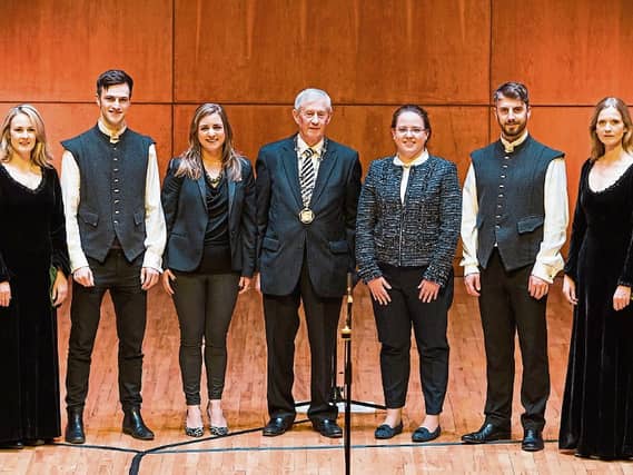 Deputy Mayor Noel Gleeson (centre) with Gillian Costelloe, left and UCH director Sinead Hope, right with members of Anúna vocal group launching Limerick Sings Picture: Sean Curtin/True Media
