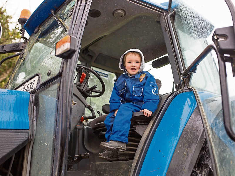 Michael Leonard is pictured on his grandfather's tractor at the launch of the Newcastle West Show