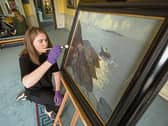 Sophie Hogan preparing Fisherman in a Currach by Paul Henry Picture: Sean Curtin