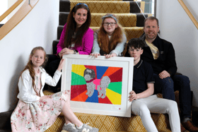 Claire O’Malley, of Catherine McAuley School, with her artwork and her mother Tara, brother Seán and father John