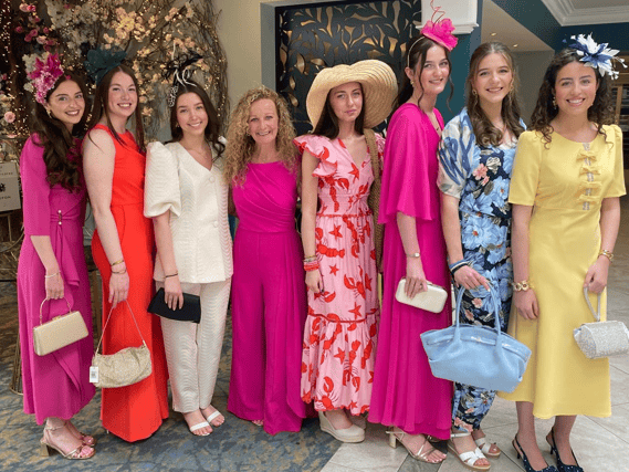 Student committee members pictured with Therese Hogan lunch coordinator, showcasing the style available from Aisling Maher Millinery & Boutique, Adare