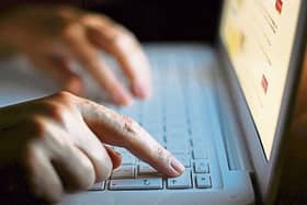The man agreed to post the laptop after the woman responded to his advertisment