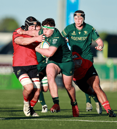 Billy Bohan breaks away from a Munster player during Connacht's 26-7 win in Galway PICTURE: Sportsfile
