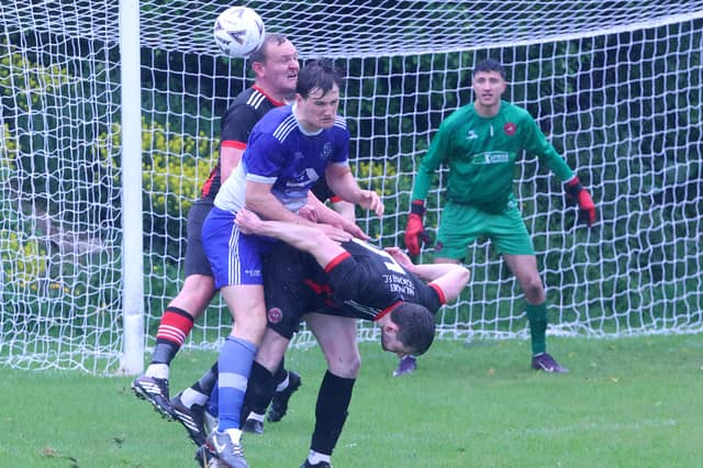 Thomas Bynres, Bally Rovers clearing the ball against Ballynanty Rovers in the FAI Junior Cup
