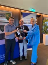 Dean McMahon receiving the 1976 Memorial Trophy from Limerick Golf Club President Ivan Morris and Dr Siobhan Grimes, Clinical Director, Bons Secours Hospital, Limerick (Sponsors).