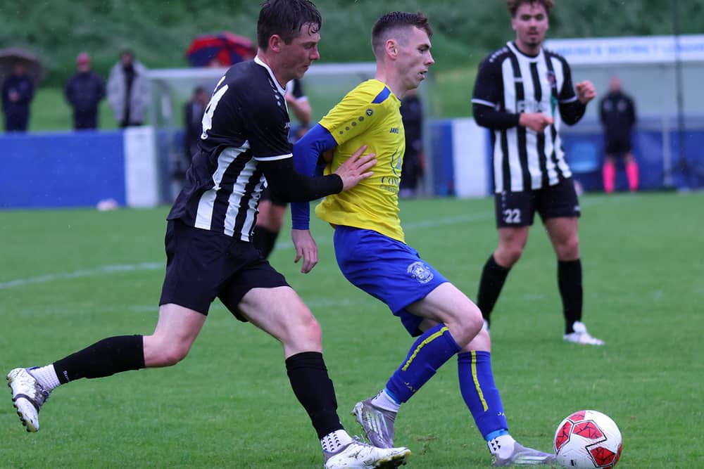 Fairview's Adam Dore in control of possession against Michael Lynch of Janesboro during the Lawson Cup Final at Jackman Park.