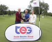 David Reddan, Caslteknock GC, being presented with the HK Murray Trophy, by Men's Club Captain, Denis O'Leary and Eimear Costelloe, Trade Electric Group 
