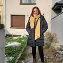 Aontu councillor Sarah Beasley, pictured outside a boarded up home in Limerick city