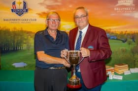 Ballyneety Golf Club Captains Prize winner John Doyle presented with the Tim Smyth Cup by Club Captain Pat Wade 