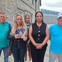 The Calvert family outside the Limerick Coroner's Court in Kilmallock holding a picture of the late Savannah (14)