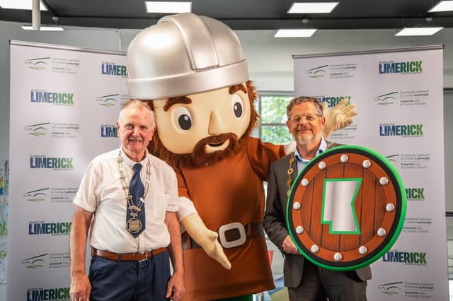 Cllr Joe Pond and Mayor of Limerick John Moran with Limerick's new mascot Val the Viking.