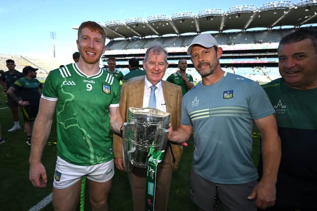 Limerick captain Cian Lynch, left, with businessman JP McManus, centre, and GAA strength & performance coach, Adrian O'Brien after the GAA Hurling All-Ireland Senior Championship Final match between Galway and Limerick at Croke Park in Dublin
Picture: Stephen McCarthy/Sportsfile