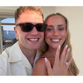 Craig Casey and Jenny Clein take a selfie with the stunning engagement ring