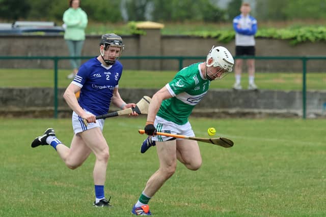 Effin's Fergal O'Connor tries to escape the attentions of Croagh-Kilfinny's Denis Lenihan during their Premier IHC clash in Ballyagran