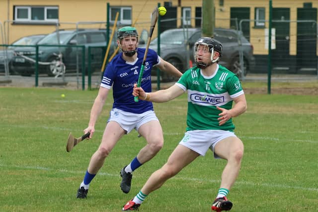 Paddy O'Donovan, Effin, in control of the ball against Eoin Barry, Croagh-Kilfinny in the Premier Intermediate Hurling Championship