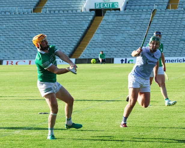 Oisin O'Reilly, Kilmallock clearing the ball against Ronan Lynch, Na Piarsaigh in the Whitebox Limerick SHC