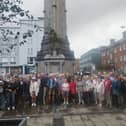 ​People attending a walk given by local historian Dr Paul O’Brien into the history of the clock tower at Baker Place