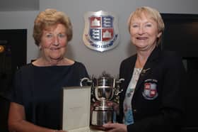 Marie McConn, Lady Captain of Limerick Golf Club presenting the Lady Captain's Prize to Agnes Foster at a prizegiving evening