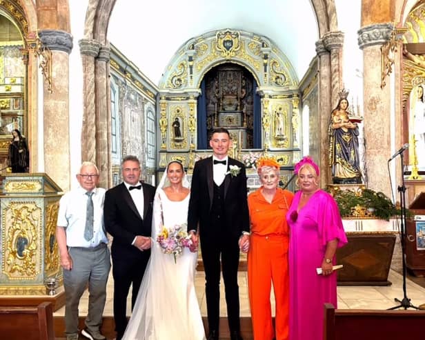 Gearóid and Niamh with family inside the chapel as the celebrated their nuptials