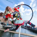 Earth Child aerialist above Millennium Bridge in Dublin