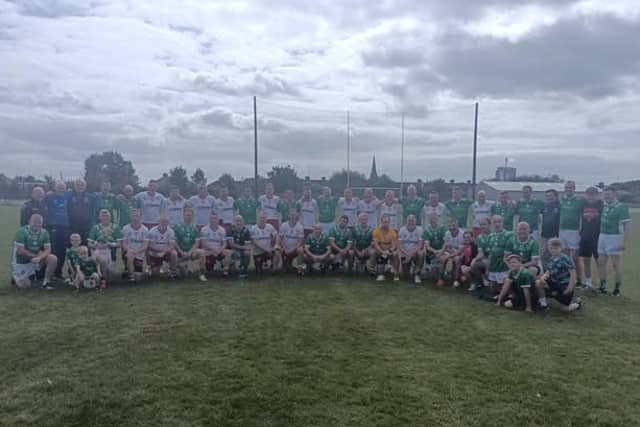 The Limerick Masters football team alongside their Tyrone counterparts