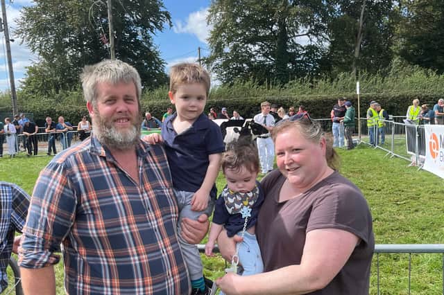 Seán and Kate Barry, Pallasgreen, with Seán Óg, aged 3, and Séimí, 7-months-old, at the cattle section in Limerick Show