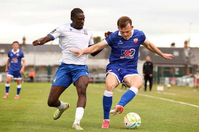 Ben Lynch of Treaty United in action against Gradi Lomboto of Athlone Town during their SSE Airtricity Men's First Division match at Markets Field in July
