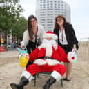 Father Christmas, pictured with his two helpers, Elaine Ryan, sales and marketing manager at Clayton Hotel and her colleague Lorraine Connellan, sales executive