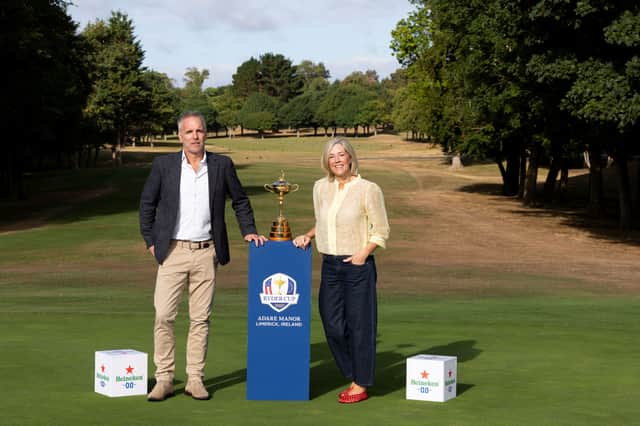Max Hamilton, Ryder Cup Europe’s Executive Commercial Director and Sharon Walsh, Managing Director of HEINEKEN Ireland, photographed with the Ryder Cup trophy at Malahide Golf Club in Dublin.