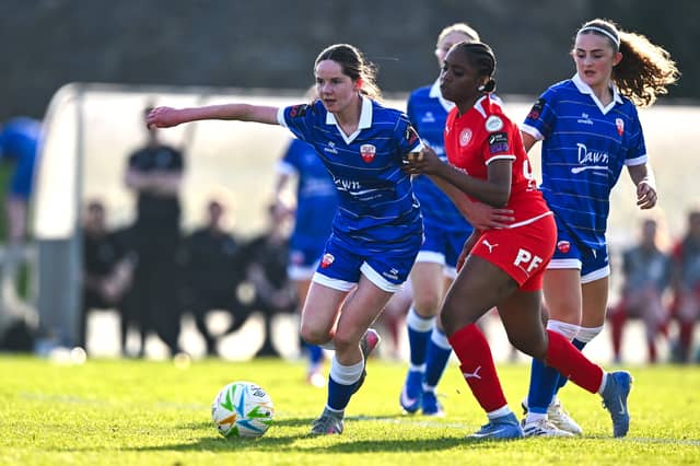 Ellen Goggin of Treaty United in action against Stephanie Dumevi of Waterford during the SSE Airtricity Women's Premier Division match between Treaty United and Waterford at Markets Field in March