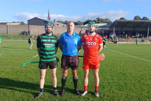 Referee Eamonn Richardson with team captain Darren Carroll (Glenroe) and Paul O'Riordan (Bruff)