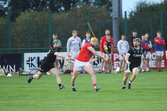 Fintan Fitzgerald fires over a point for Mungret St Pauls under pressure from Newcastle West's Jody Woulfe and Aaron Neville during their Limerick SHC game in Mick Neville Park, Rathkeale