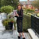 Striking a pose with my memoir, Glamour & Grit, at this week's launch!