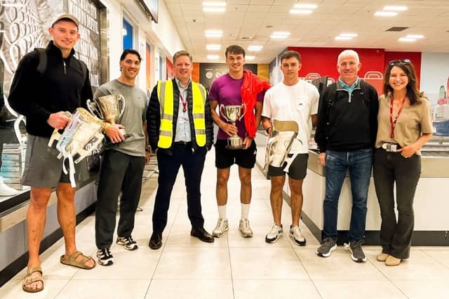 Limerick hurlers Gearóid Hegarty, Sean Finn, Cathal O'Neill and Aidan O'Connor with manager John Kiely alongside Shannon Airport's Emma Foote and Ruairí Kennedy ahead of their trip to New York