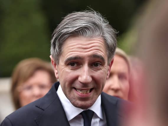 Headshot of Tánaiste Simon Harris speaking