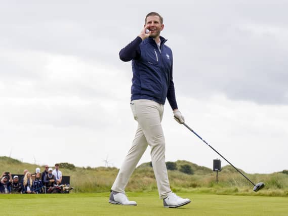 Eric Trump playing golf